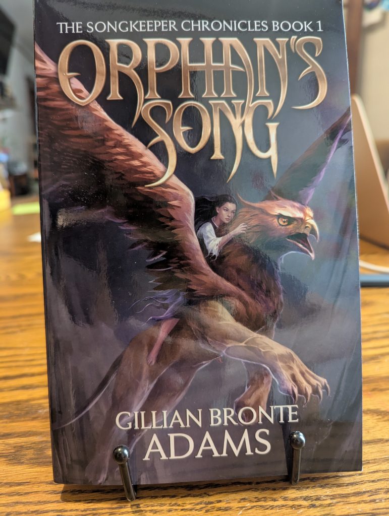Orphan's song by Gillian Bronte Adams, signed at Realm Makers